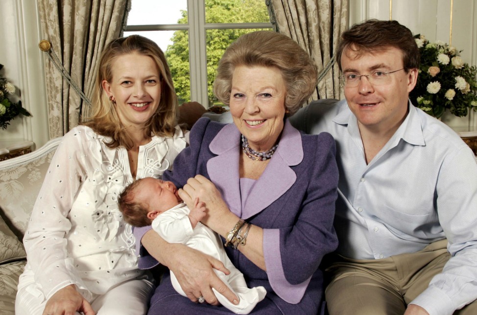File photo of Queen Beatrix of the Netherlands posing with her son Prince Johan Friso, his wife Princess Mabel and the couple's daughter Countess Luana