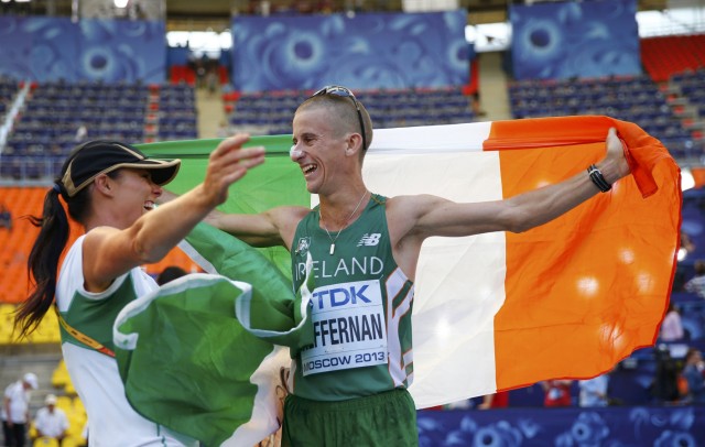 Heffernan of Ireland celebrates winning the men's 50 km race walk final with his wife Marian during the IAAF World Athletics Championships in Moscow