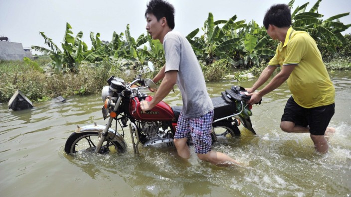 Sturm Hochwasser Asien Russland China Philippinen