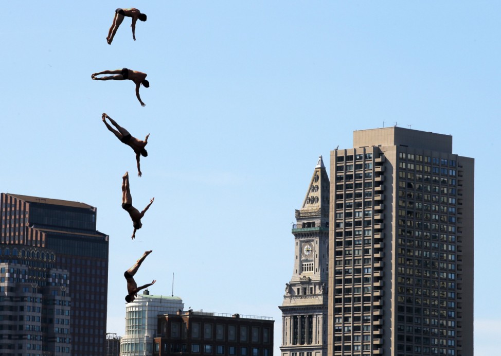 Steven LoBue of the United States dives off the roof of the Institute of Contemporary Art during the Red Bull Cliff Diving World Series 2013 competition in Boston