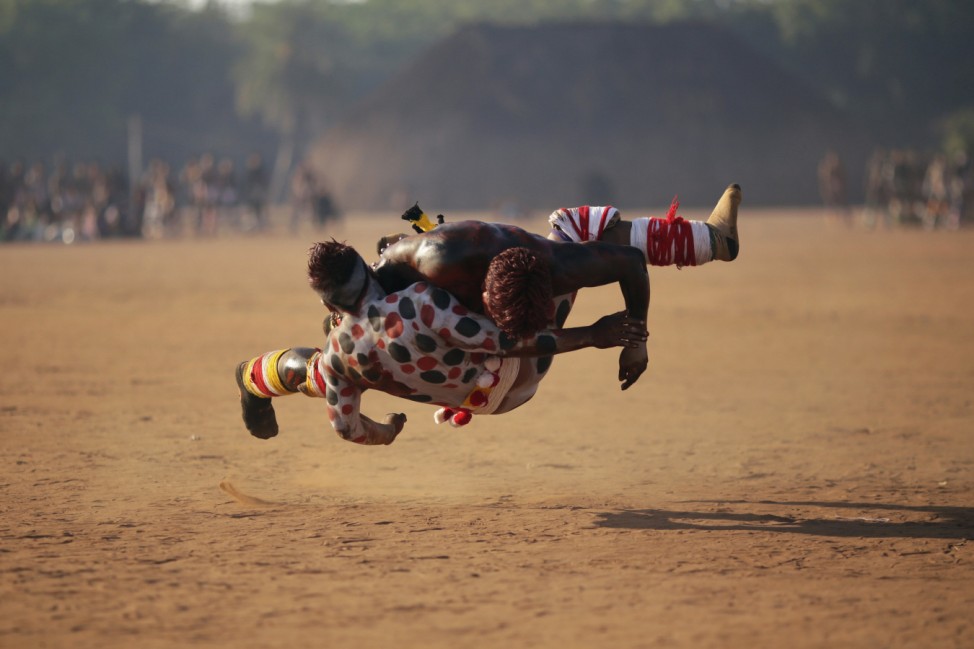 Waura Indians wrestle during this year's 'quarup' in Xingu National Park