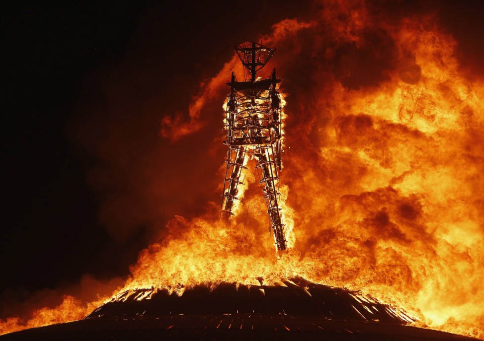 The Man burns during the Burning Man 2013 arts and music festival in the Black Rock Desert of Nevada