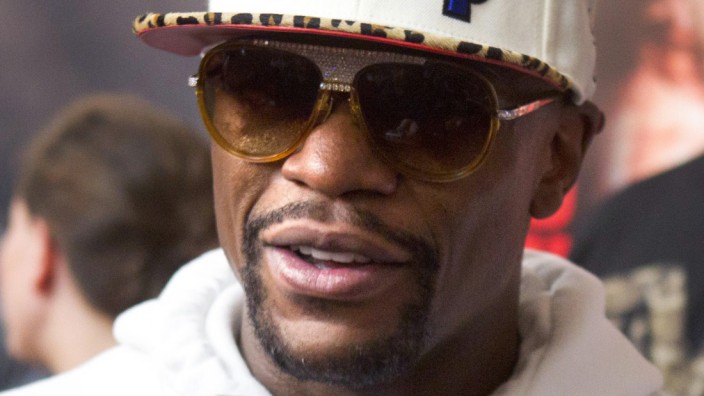 Undefeated boxer Floyd Mayweather Jr. of the U.S. talks with reporters at the Mayweather Boxing Club in Las Vegas
