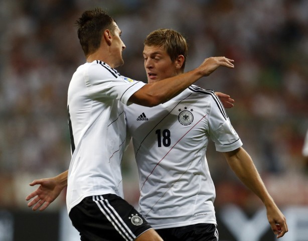 Germany's Klose and Kroos celebrate during their 2014 World Cup qualifying soccer match against Austria in Munich