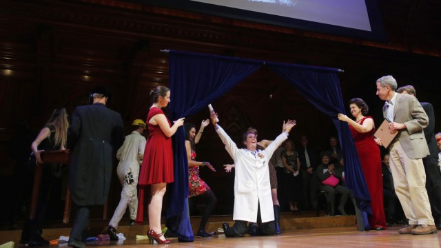 Brian Crandall is unveiled as the winner of the 2013 Archaeology Prize during the 23rd First Annual Ig Nobel Prize ceremony at Harvard University in Cambridge
