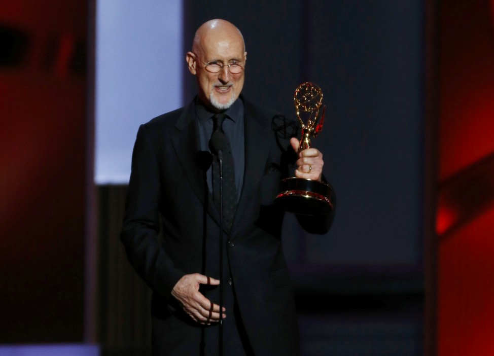 James Cromwell accepts the award for Outstanding Supporting Actor In A Miniseries Or A Movie for 'American Horror Story: Asylum' at the 65th Primetime Emmy Awards in Los Angeles