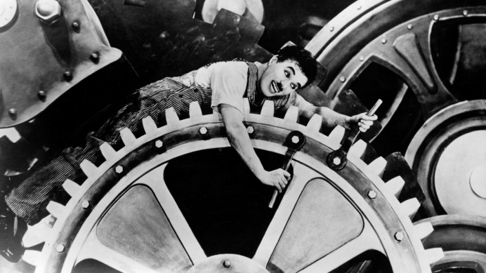Tyrannei der Arbeit: Immer schneller, immer mehr: Manch ein Arbeitnehmer fühlt sich wie Charlie Chaplin in dem Stummfilm-Klassiker "Moderne Zeiten"