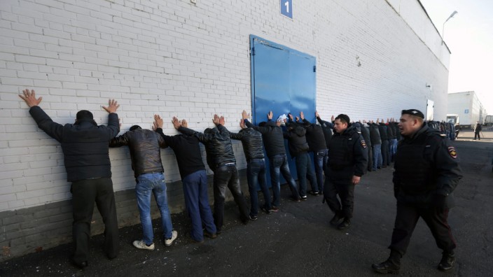 Russian police detain alleged illegal migrants