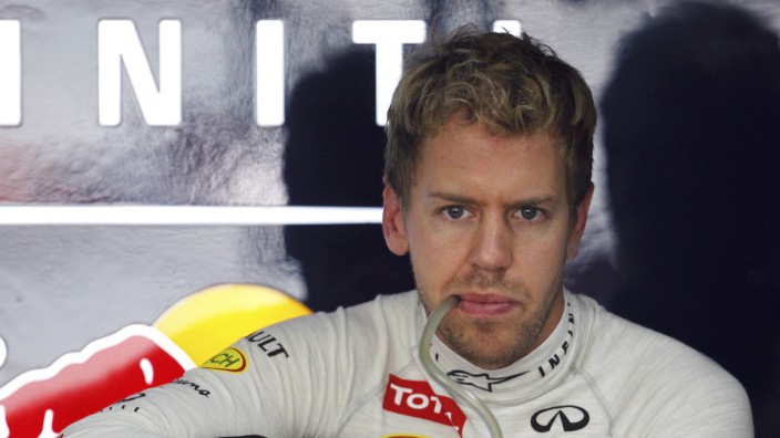 Red Bull Formula One driver Vettel is seen at the team garage during the first practice session of the Indian F1 Grand Prix at the Buddh International Circuit in Greater Noida
