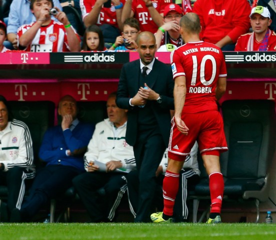 Munich's Arjen Robben leaves the pitch after he was substituted during their German first division Bundesliga soccer match against Hertha Berlin in Munich