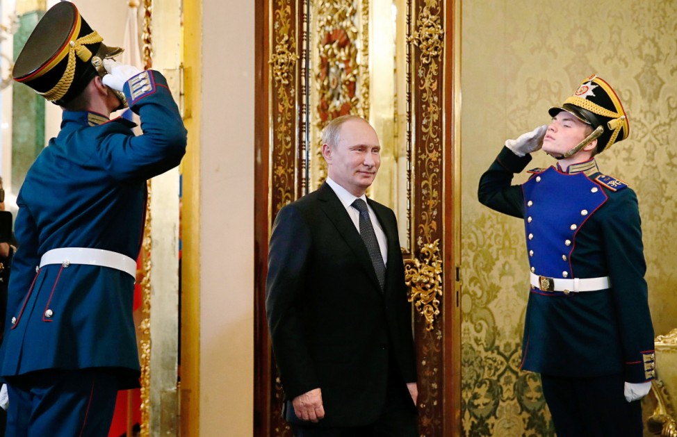 Russian President Vladimir Putin arrives for a meeting with Ecuadorean President Rafael Correa in Moscow