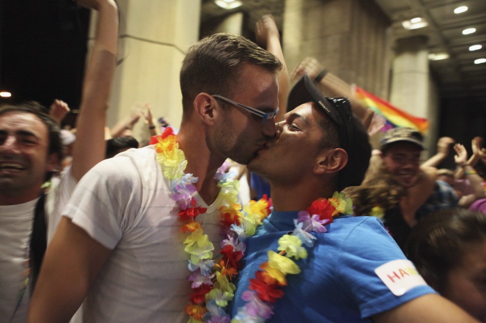Raffesberger and partner Sanchez celebrate after Hawaii State Legislature voted on allowing same sex marriage to legal in state of Hawaii in Honolulu