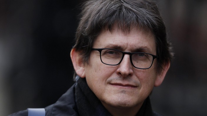 File photo of Alan Rusbridger, the editor of the Guardian, arriving to give evidence at the Leveson Inquiry into the culture, practices and ethics of the media, in central London