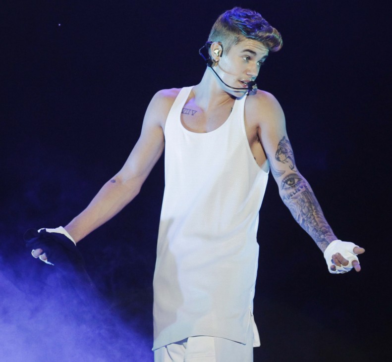 Singer Justin Bieber performs during his Latin America tour concert at the Jockey Club in Asuncion