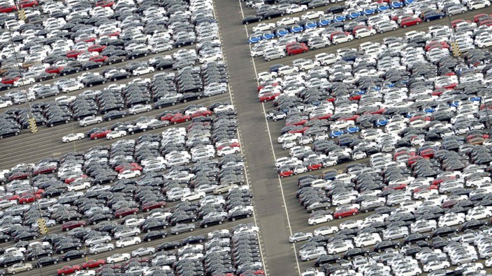 File photo of cars for export standing in a parking area at a shipping terminal in harbour of Bremerhaven