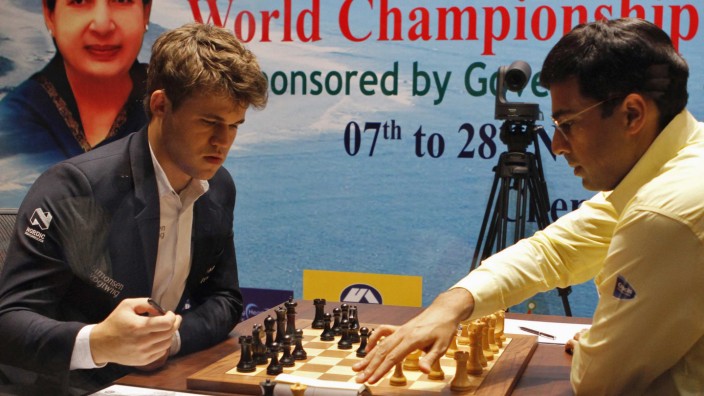 India's Anand plays against Norway's Carlsen during the FIDE World Chess Championship in Chennai