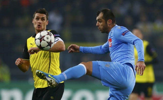 Borussia Dortmund's Kehl fights for the ball with Napoli's Pandev during their Champions League group F soccer match in Dortmund
