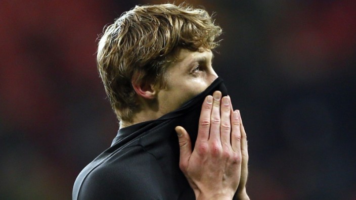 Bayer Leverkusen's Kiessling reacts after losing to Manchester United in Champions League soccer match in Leverkusen
