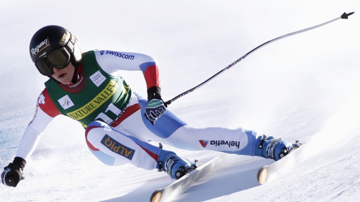 Gut of Switzerland skis past a gate on her way to winning the women's World Cup downhill ski race in Beaver Creek