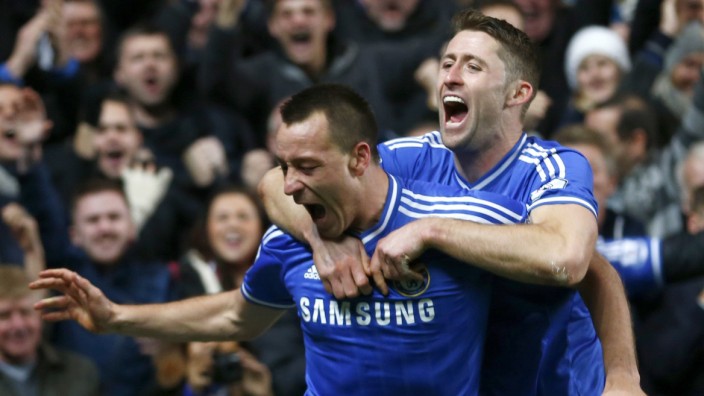 Chelsea's Terry celebrates with Cahill after scoring a goal against Southampton during their English Premier League soccer match at Stamford Bridge in London
