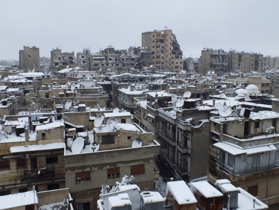 A view of the besieged area of Homs covered with snow