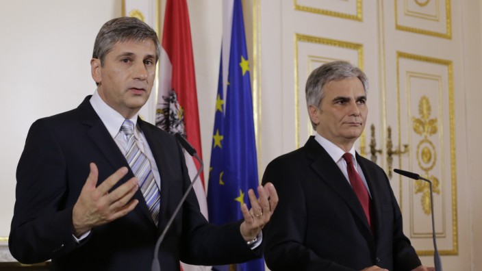 Austrian Chancellor Faymann and Vice-Chancellor Spindelegger address the media in Vienna