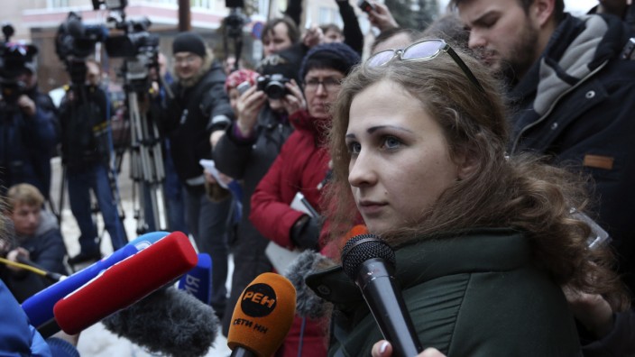 Alyokhina, member of Russian punk band Pussy Riot, speaks to the media after her release from a penal colony in Nizhny Novgorod