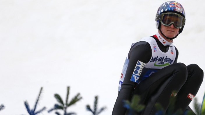 Austria's Morgenstern reacts on the wind conditions during the third jumping of the four-hills tournament in Innsbruck