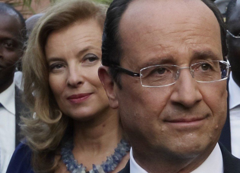 File photo of French President Francois Hollande and his companion Valerie Trierweiler visiting Goree Island