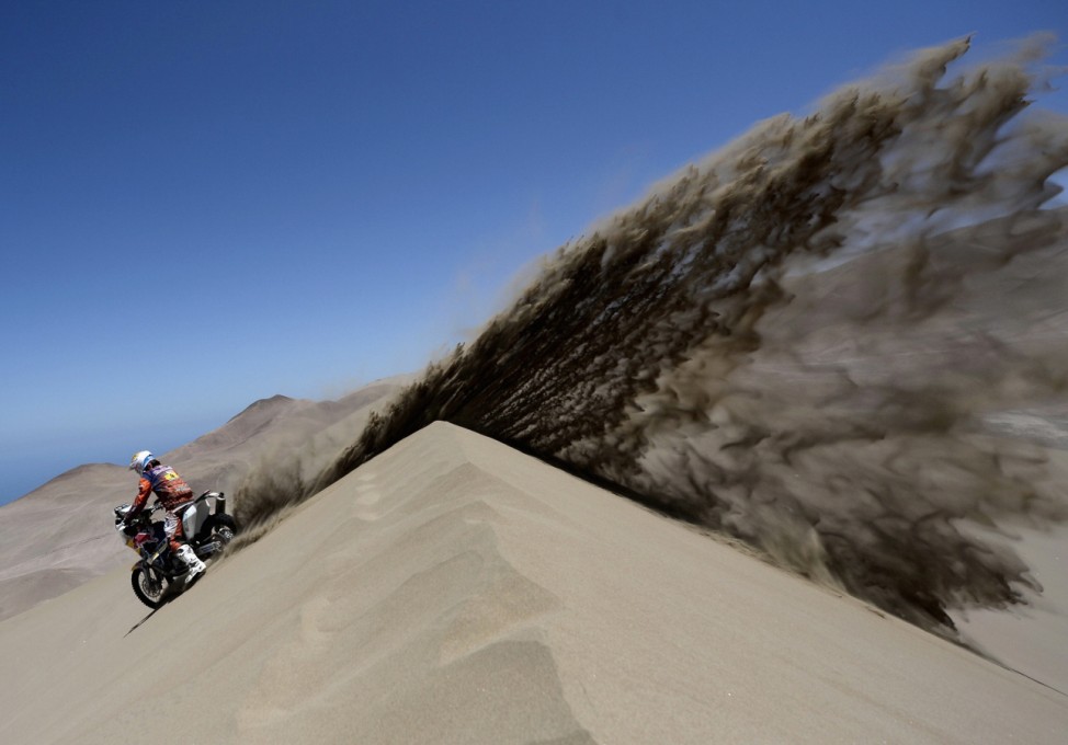 Spain's Viladoms rides his KTM motorcycle during the ninth stage of the Dakar Rally 2014, from Calama to Iquique