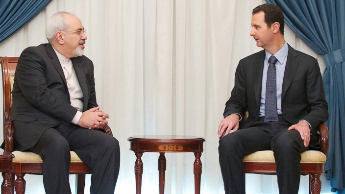 Syria's President Assad meets Iran's Foreign Minister Zarif in Damascus
