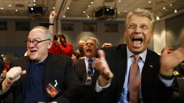 ESA Director General Dordain and ESOC Director General Reiter react after ESA's satellite Rosetta resent a signal to ESOC in Darmstadt