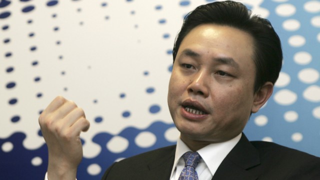 File photo of Huang Guangyu speaking during an interview in Beijing