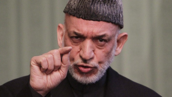Karzai demands US focus on peace process before signing pact