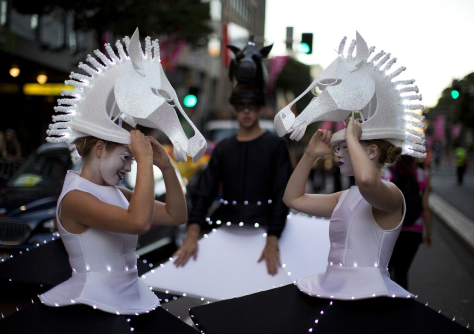 Ballerinas don horse heads on the third day of the Lunar New Year in Sydney