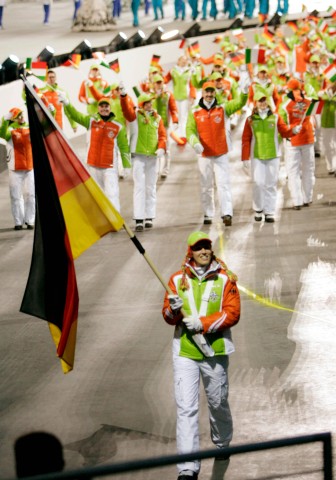 Kati Wilhelm of Germany leads team into stadium during opening ceremony of Torino 2006 Winter Olympic Games in Turin