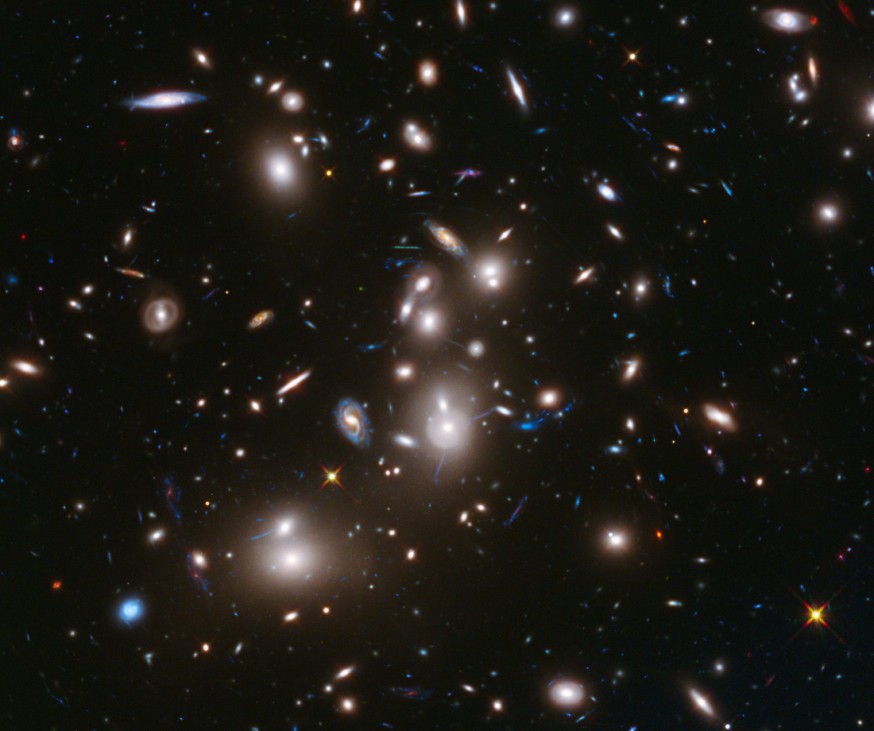 A long-exposure Hubble Space Telescope image of massive galaxy cluster Abell 2744 is seen in NASA handout