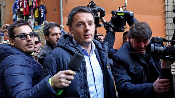 Italian Democratic Party leader Matteo Renzi arrives for party me