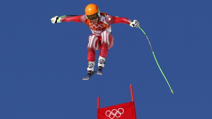 Switzerland's Viletta goes airborne during the slalom run of the men's alpine skiing super combined event at the 2014 Sochi Winter Olympics