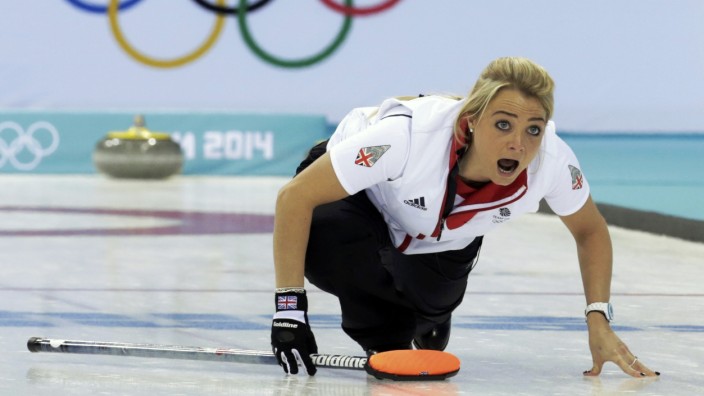 Britain's Sloan shouts to teammates during their women's curling round robin game against Russia at the 2014 Sochi Winter Olympics