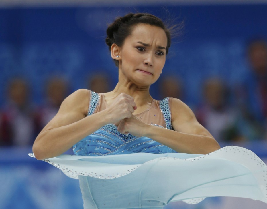Anne Line Gjersem competes during the figure skating women's short program at the 2014 Sochi Winter Olympics