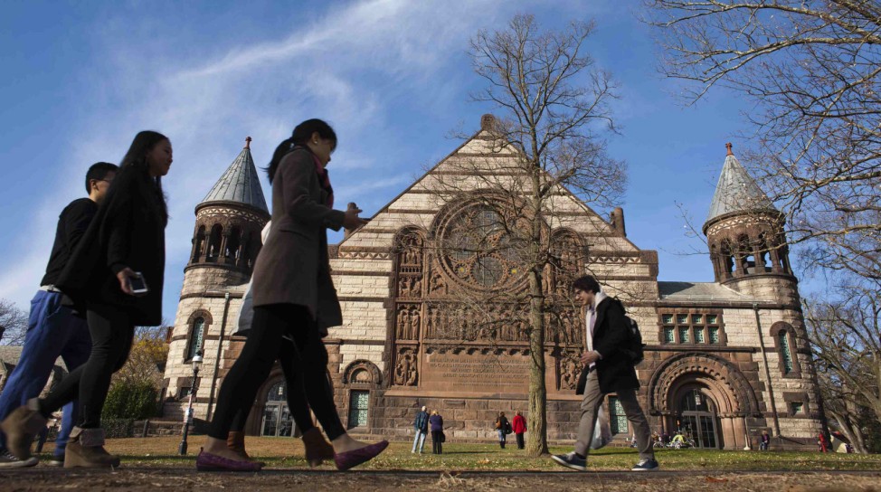 People walk around the Princeton University campus in New Jersey