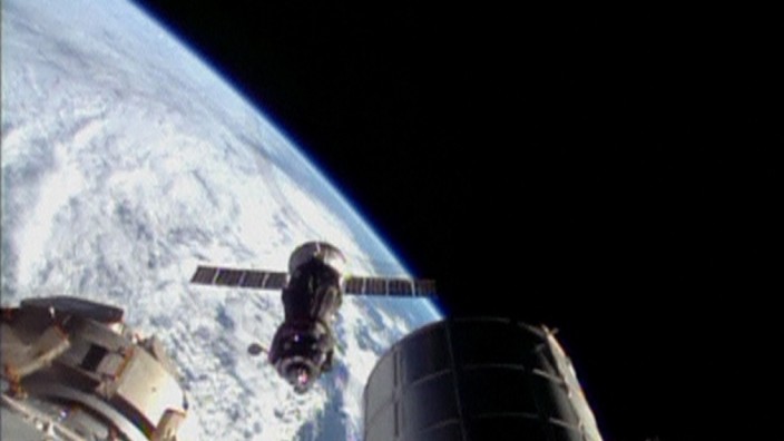 Still image taken from video shows the Soyuz spacecraft preparing to dock with the International Space Station