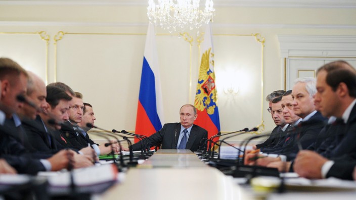 Russia's President Putin attends a meeting with members of the government at the Novo-Ogaryovo state residence outside Moscow