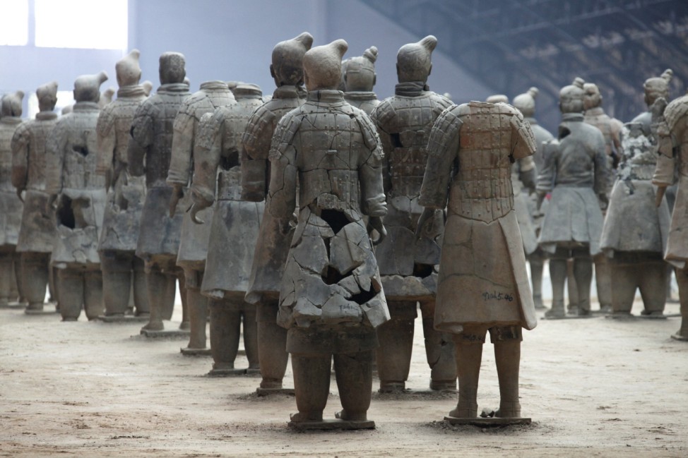 Terracotta warriors stand in rows at the excavation site located on the outskirts of the Chinese city of Xian