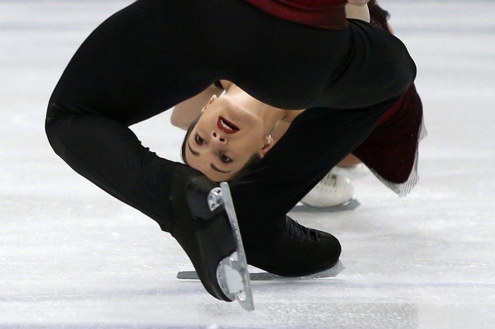 Russia's Stolbova and Klimov compete during the pairs short program at the ISU World Figure Skating Championships in Saitama