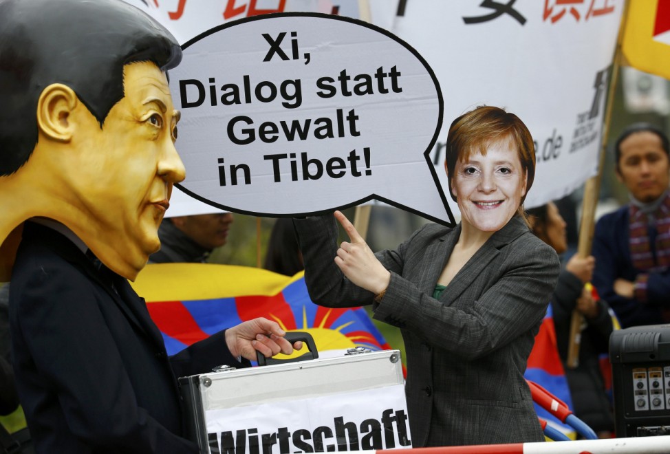 Pro-Tibet activists demonstrate during visit by Chinese President Xi at Bellevue presidential palace in Berlin