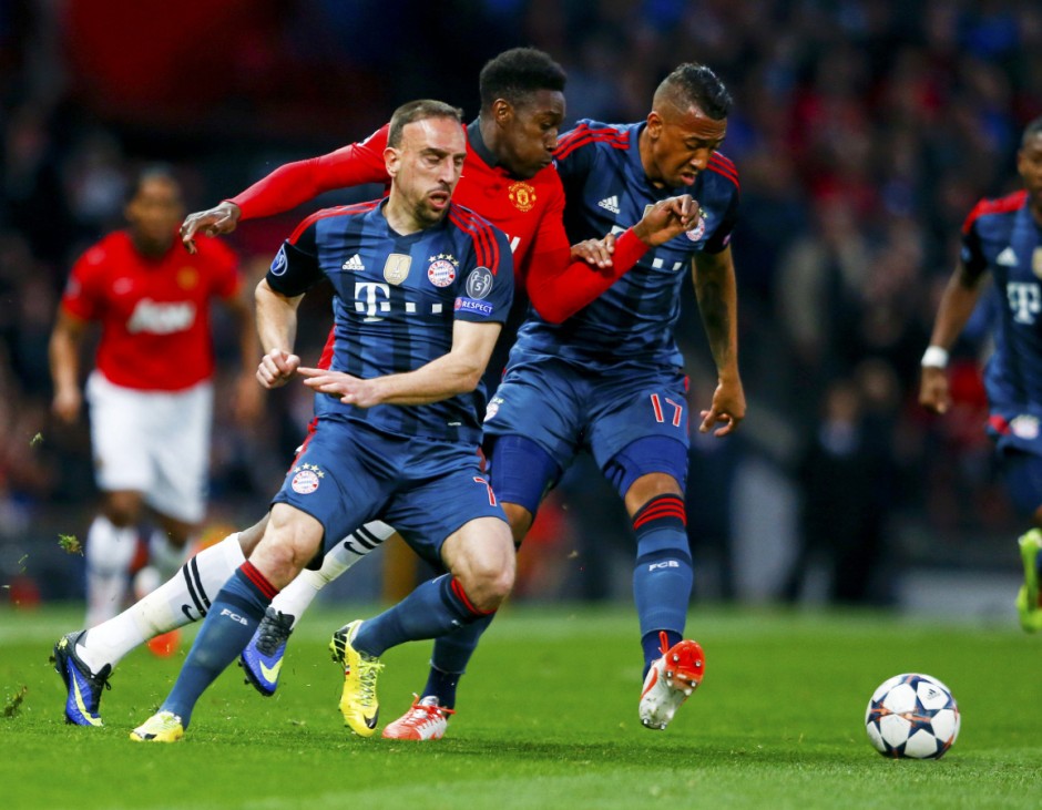 Bayern Munich's Ribery and Boateng challenge Manchester United's Welbeck during their Champions League quarter-final first leg soccer match at Old Trafford in Manchester