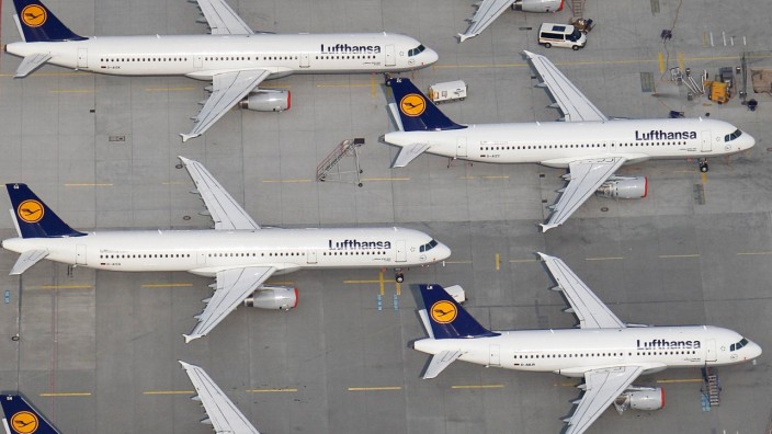 File aerial photo shows Lufthansa planes parked on the tarmac of the closed Frankfurt's airport