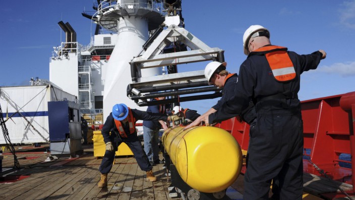 Bluefin 21, the Artemis AUV, is hoisted back on board the Australian Defence Vessel Ocean Shield after a buoyancy test in the southern Indian Ocean during the continuing search for missing Malaysian Airlines flight MH370